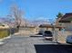 Convenient parking area with mountain views, secure fencing, and easy access to the property at 741 Bourbon St # E3, Pahrump, NV 89048
