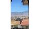 Exterior view featuring mountain views and nearby residences at 741 Bourbon St # E3, Pahrump, NV 89048