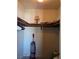 Walk-in closet with shelves, clothing hangers, and vacuum at 741 Bourbon St # E3, Pahrump, NV 89048