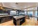 Spacious kitchen featuring granite countertops, stainless steel appliances, and plenty of cabinet space at 7520 Jacaranda Bay St, Las Vegas, NV 89139