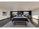 Airy main bedroom features natural light, dark wood floors, and an airy feel at 7520 Jacaranda Bay St, Las Vegas, NV 89139