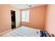 Bedroom features neutral paint and laminate flooring and built in closet at 836 Sheerwater Ave, Henderson, NV 89052