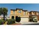 Inviting two-story home featuring a neutral color palette, low maintenance landscaping and an attached two car garage at 836 Sheerwater Ave, Henderson, NV 89052