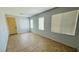 Neutral living area featuring ceramic tile floors, light gray walls and lots of natural light at 836 Sheerwater Ave, Henderson, NV 89052