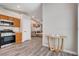 Bright kitchen features stainless steel appliances and wood cabinets for a modern yet welcoming culinary space at 9292 Vervain Ct, Las Vegas, NV 89149