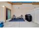 Cozy patio with outdoor seating and a grill, perfect for enjoying outdoor meals at 9292 Vervain Ct, Las Vegas, NV 89149