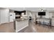Open kitchen featuring granite counters, stainless appliances, and an island with seating at 958 Harbor Ave, Henderson, NV 89002