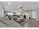 Spacious living room featuring hardwood floors, neutral color palette and ample natural light at 958 Harbor Ave, Henderson, NV 89002