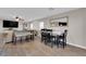 Bright living room connects to a dining area and features hardwood floors at 958 Harbor Ave, Henderson, NV 89002