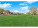 Expansive green space with mature trees and landscaped borders in a well-maintained community at 958 Harbor Ave, Henderson, NV 89002