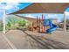 Community playground under a sunshade, offering a safe recreational space for families at 958 Harbor Ave, Henderson, NV 89002
