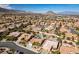 Beautiful aerial view showcasing the property, pool, and a gorgeous desert landscape in the distance at 9816 Gerald Ct, Las Vegas, NV 89134
