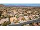 Beautiful aerial view showcasing the property, lush mature landscaping, and a great location in the city at 9816 Gerald Ct, Las Vegas, NV 89134