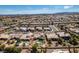 Great location with views of the city from this property, surrounded by lush landscaping and a pool at 9816 Gerald Ct, Las Vegas, NV 89134