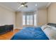 Bedroom with a large bay window, ceiling fan, hardwood floors at 9816 Gerald Ct, Las Vegas, NV 89134