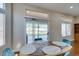 A dining area with glass doors to the backyard and a view of the pool at 9816 Gerald Ct, Las Vegas, NV 89134