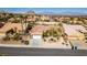 Charming single-story home featuring a well-manicured front yard and a two-car garage at 9816 Gerald Ct, Las Vegas, NV 89134