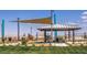Community playground with covered picnic area and modern play structures at 1409 Brady Bay Pl # 110, North Las Vegas, NV 89084