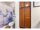 Bathroom featuring shower with blue flower shower curtain at 1455 E Katie Ave # A21, Las Vegas, NV 89119