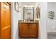 Bathroom featuring wood vanity with granite countertop at 1455 E Katie Ave # A21, Las Vegas, NV 89119