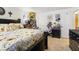 Bedroom featuring a large window and dark furniture set at 1455 E Katie Ave # A21, Las Vegas, NV 89119