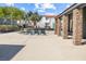 Community pool with several lounge chairs and covered area to relax at 1455 E Katie Ave # A21, Las Vegas, NV 89119