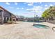 Community pool and hot tub on a sunny day with ample space for residents to enjoy at 1455 E Katie Ave # A21, Las Vegas, NV 89119