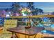 Balcony with a view of the High Roller and a table set for two with champagne at 210 E Flamingo Rd # 326, Las Vegas, NV 89169