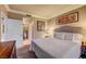 Cozy bedroom with a serene ambiance and an attached bathroom at 210 E Flamingo Rd # 326, Las Vegas, NV 89169