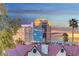 A view of the city and mountains with rooftops in the foreground at 210 E Flamingo Rd # 326, Las Vegas, NV 89169