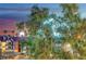 Colorful building with mature trees in a serene setting at 210 E Flamingo Rd # 326, Las Vegas, NV 89169