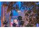 Stunning view of Encore Hotel and Casino with palm trees at 210 E Flamingo Rd # 326, Las Vegas, NV 89169