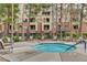 Relax in the inviting hot tub, nestled among trees and featuring comfortable seating for residents and guests at 210 E Flamingo Rd # 326, Las Vegas, NV 89169