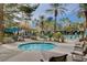 Outdoor hot tub and community with lush landscaping, resort-style amenities, and serene seating areas at 210 E Flamingo Rd # 326, Las Vegas, NV 89169