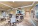 Open floor plan features kitchen and dining area with mirrored wall and bar seating at 210 E Flamingo Rd # 326, Las Vegas, NV 89169