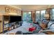 Comfortable living room with large windows to let in natural light, an outdoor balcony, and comfortable leather seating at 210 E Flamingo Rd # 326, Las Vegas, NV 89169