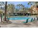 Enjoy the community pool with palm trees, lounge chairs, and poolside cabanas, creating a resort-like atmosphere at 210 E Flamingo Rd # 326, Las Vegas, NV 89169