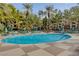 Enjoy the beautiful pool surrounded by lush palm trees and manicured landscaping, perfect for relaxation and recreation at 210 E Flamingo Rd # 326, Las Vegas, NV 89169