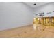 Indoor racquetball court featuring hardwood floors, white walls, and glass windows looking out to the pool area at 210 E Flamingo Rd # 326, Las Vegas, NV 89169
