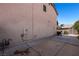 Backyard view showing house wall, patio, shed and grill at 2199 Maple Shade St, Henderson, NV 89002