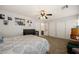 Spacious bedroom with neutral tones, ample closet space, and an ensuite bathroom at 2199 Maple Shade St, Henderson, NV 89002