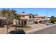 Two-story home featuring tile roof and extended driveway on a sunny day at 2199 Maple Shade St, Henderson, NV 89002