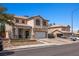 Inviting two-story home with a well-kept lawn and ample parking at 2199 Maple Shade St, Henderson, NV 89002