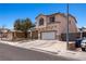 Charming two-story home with a well-maintained front yard and long driveway at 2199 Maple Shade St, Henderson, NV 89002