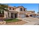 Two-story home featuring tile roof and extended driveway on a sunny day at 2199 Maple Shade St, Henderson, NV 89002