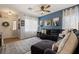 Welcoming living room with a comfy sofa, a large window, and an elegant entryway at 2199 Maple Shade St, Henderson, NV 89002