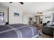 Spacious bedroom with ample natural light, comfortable seating, and an en-suite bathroom at 2199 Maple Shade St, Henderson, NV 89002