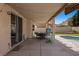 Covered patio with dining set, ideal for enjoying meals outdoors at 2199 Maple Shade St, Henderson, NV 89002