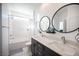 Bathroom featuring a dual sink vanity and shower and tub combination at 2514 Spergola St, Henderson, NV 89044