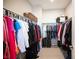 Walk-in closet with ample hanging space for clothing and organized storage at 2514 Spergola St, Henderson, NV 89044